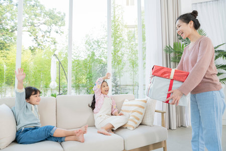 Portrait of happy cheerful family, young mother and two daughters 133の写真素材