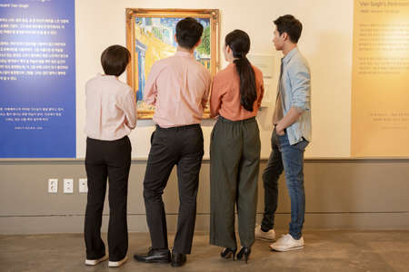 People with guide at exhibition in art gallery 027の写真素材