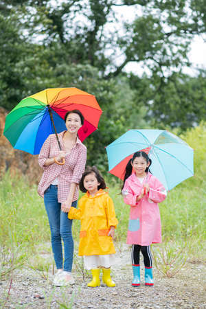 Portrait of happy cheerful family, young mother and two daughters 241の写真素材