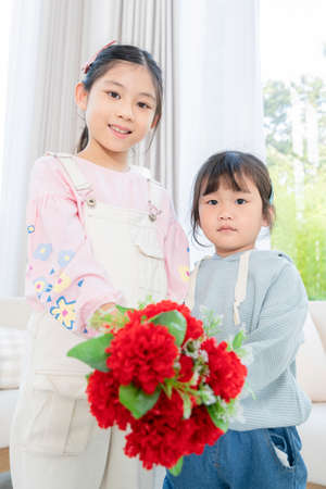 Portrait of happy cheerful family, young mother and two daughters 131の写真素材