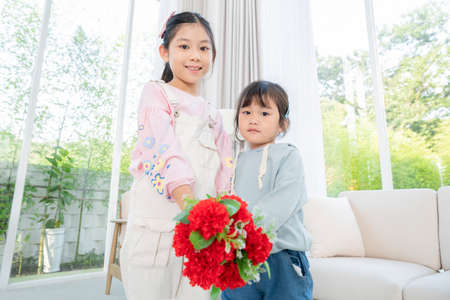 Portrait of happy cheerful family, young mother and two daughters 130の写真素材