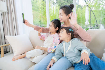 Portrait of happy cheerful family, young mother and two daughters 105の写真素材