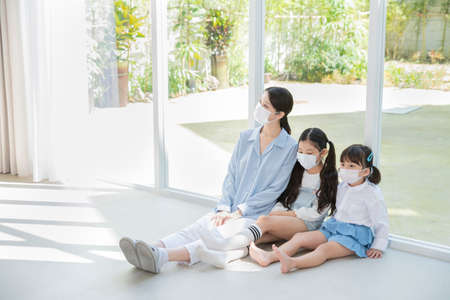 Portrait of happy cheerful family, young mother and two daughters 317の写真素材