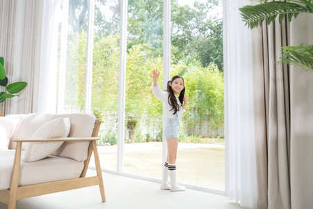Portrait of happy cheerful family, young mother and two daughters 301の写真素材