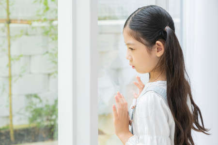 Portrait of happy cheerful family, young mother and two daughters 296の写真素材