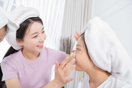 Portrait of happy cheerful family, young mother and two daughters 443の写真素材
