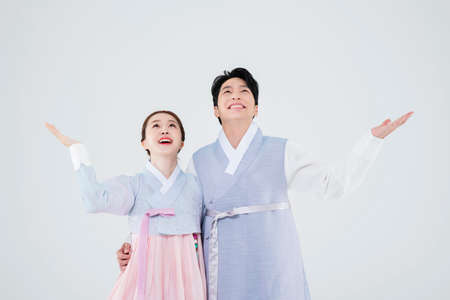 Male and female in Korean traditional clothes Hanbok 077の写真素材