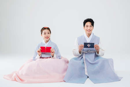 Male and female in Korean traditional clothes Hanbok 170の写真素材