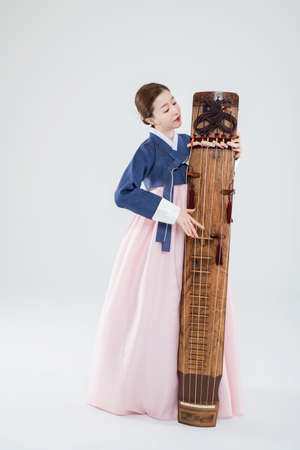female in Korean traditional clothes Hanbok. comic humorous concept. 082の写真素材