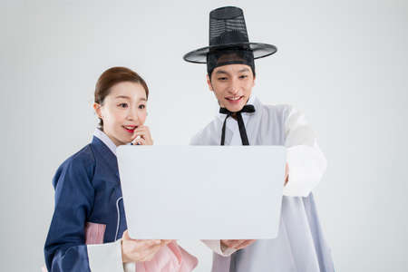 Male and female in Korean traditional clothes Hanbok. comic humorous concept. 134の写真素材