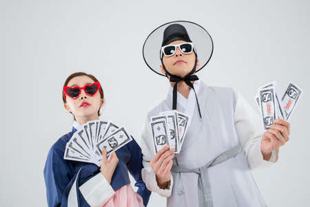 Male and female in Korean traditional clothes Hanbok. comic humorous concept. 055の写真素材
