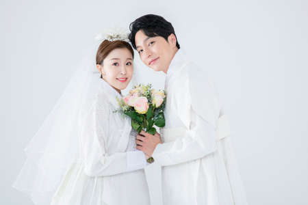 Wedding couple wears korean traditional korean wedding dress Hanbok 100の写真素材