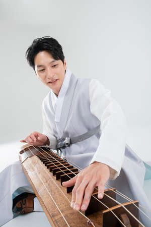 Male and female in Korean traditional clothes Hanbok. comic humorous concept. 075の写真素材