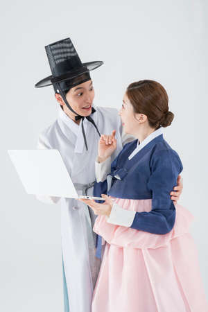 Male and female in Korean traditional clothes Hanbok. comic humorous concept. 133の写真素材