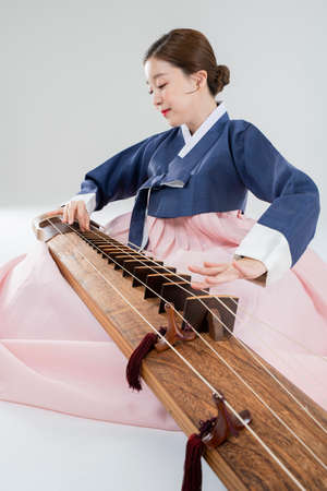 Male and female in Korean traditional clothes Hanbok. comic humorous concept. 092の写真素材