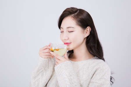 Asian female model with long hair, winter beauty conceptの写真素材