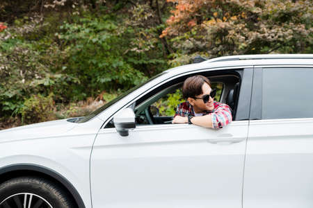 handsome Asian male model autumn travel concept