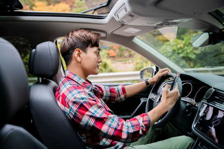handsome Asian male model autumn travel concept