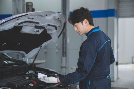 auto vehicle Service repair center concept with maintenance staffの写真素材