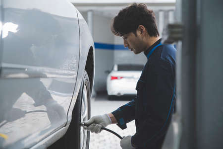 auto vehicle Service repair center concept with maintenance staffの写真素材