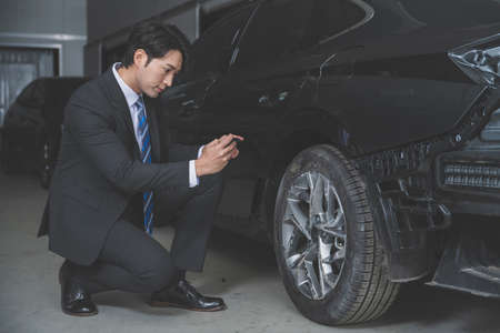auto vehicle car insurance agent, car reseller taking photoの写真素材