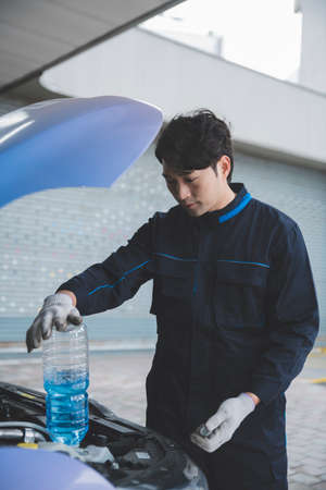 auto vehicle Service repair center concept with maintenance staffの写真素材