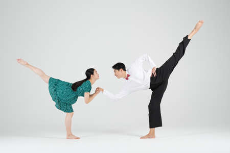 retro concept, contemporary couple dancer in white backgroundの写真素材