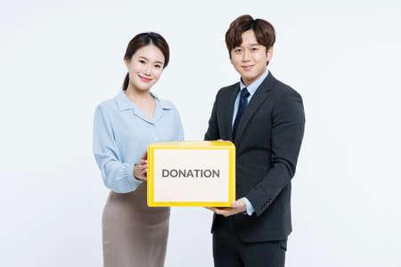 business, startup, people and teamwork concept with donation boxの写真素材