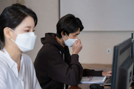 business, startup, people and teamwork with mask concept