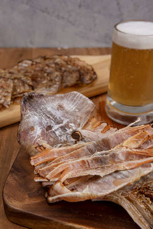 dried squid, filefish and beer