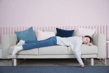 bored Asian single solo woman living alone conceptの写真素材