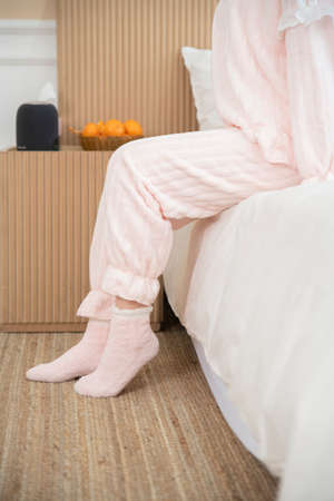 pink fluffy pajamas and sleeping slumber socksの写真素材