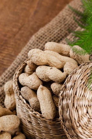 peanuts on woven cloth and basket