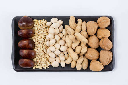 mix of pine nuts, walnuts, ginkgo nuts, chestnuts, peanuts