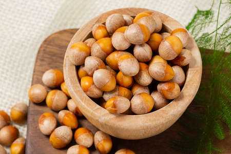 ginkgo nuts in wood bowl