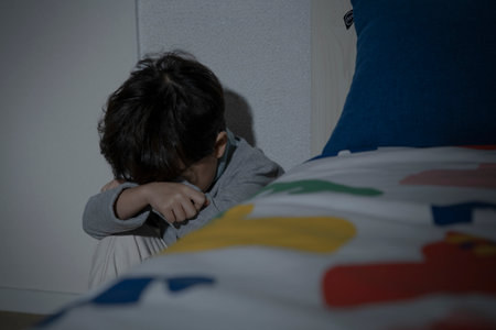 depressed Asian child in fear due to child abuse and violence, Human Rights Day conceptの写真素材