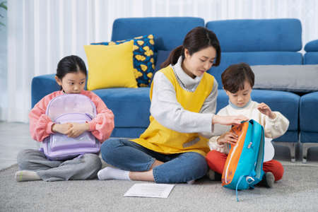 Asian children babysitter, daycare conceptの写真素材