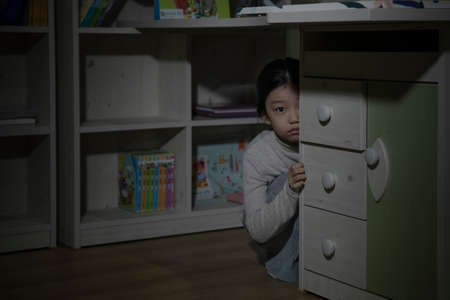 Asian child in fear due to child abuse and violence, Human Rights Day conceptの写真素材