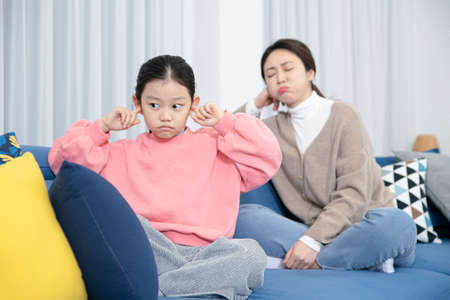 Asian mom and daughter concept with miscommunication, troubles, fight