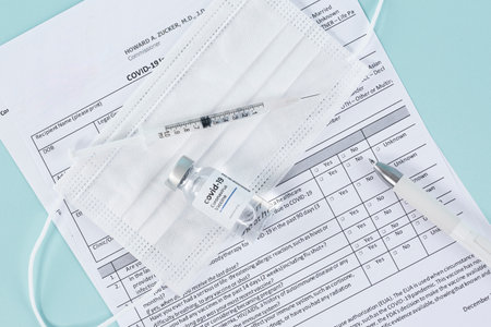 Covid vaccine, syringe and test stripの写真素材