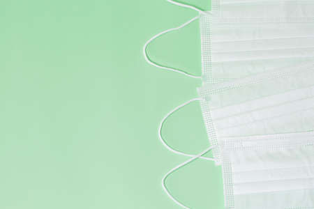 face mask, light green backgroundの写真素材