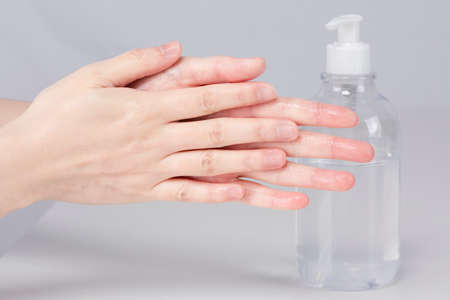 using hand sanitizer, disinfect handsの写真素材