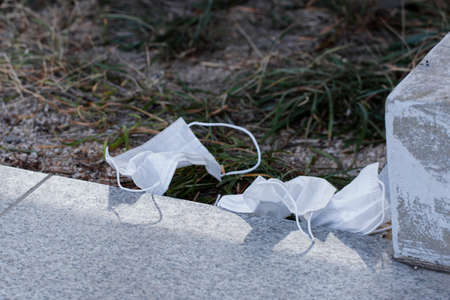 mask disposed, thrown on streetの写真素材