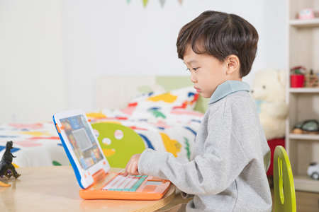 Asian boy studying