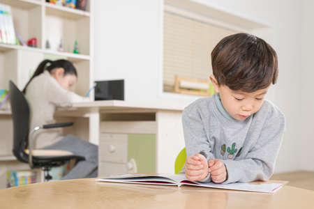 Asian girl and boy studying