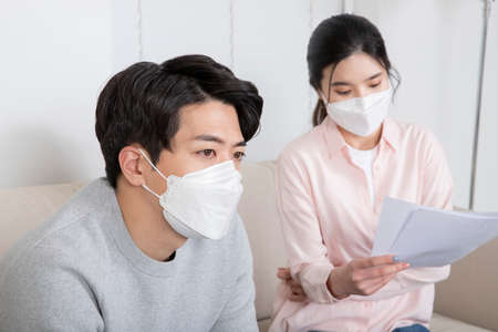 Asian couple waiting for  test result