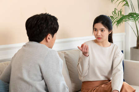 newly married Asian couple fighting at home conceptの写真素材