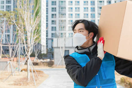 Asian delivery man working conceptの写真素材