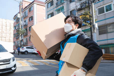 Asian Korean delivery man working concept