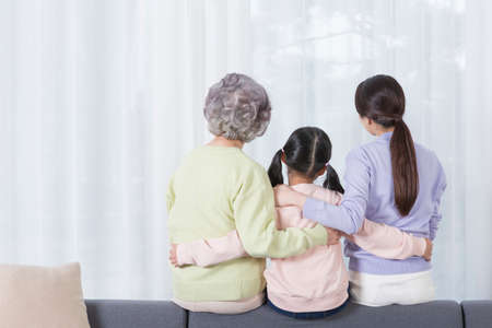 three generations of women, Asian grandmother, mother and grand daughterの写真素材